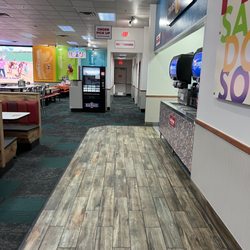 Chuck E. Cheese - Floors very clean and restaurant signage
