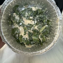Asked for a to-go side Caesar salad before leaving and this is all they gave me in my to-go container for 8 bucks.