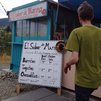 El sabor De Marina - a man standing in front of a restaurant - Mexican Near Me - Oliver, British Columbia El sabor De Marina - a man standing in front of a restaurant - Mexican Near Me - Oliver, British Columbia