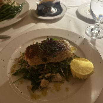III Forks - Market Fish of the Day* (Halibut with jumbo crab lumps over arugula)! Delicious - Steakhouses Near Me - Austin, Texas