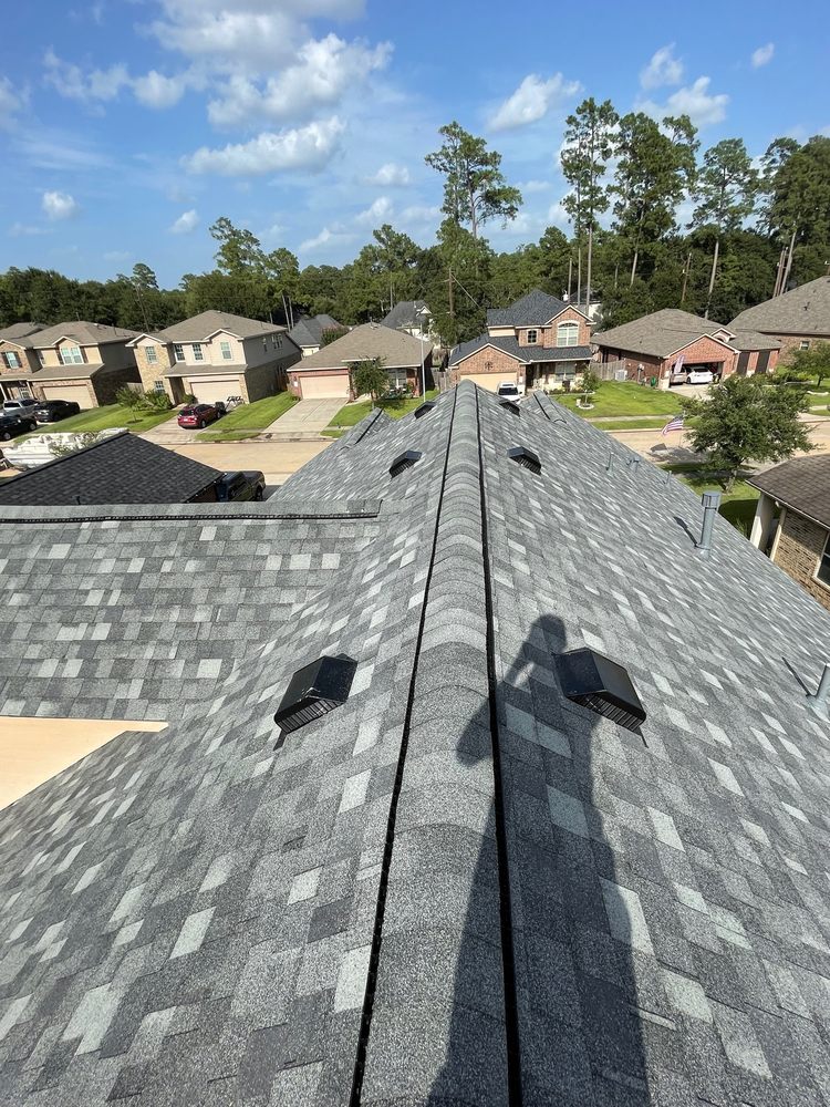 Slide of Rapid Roofing and Construction
