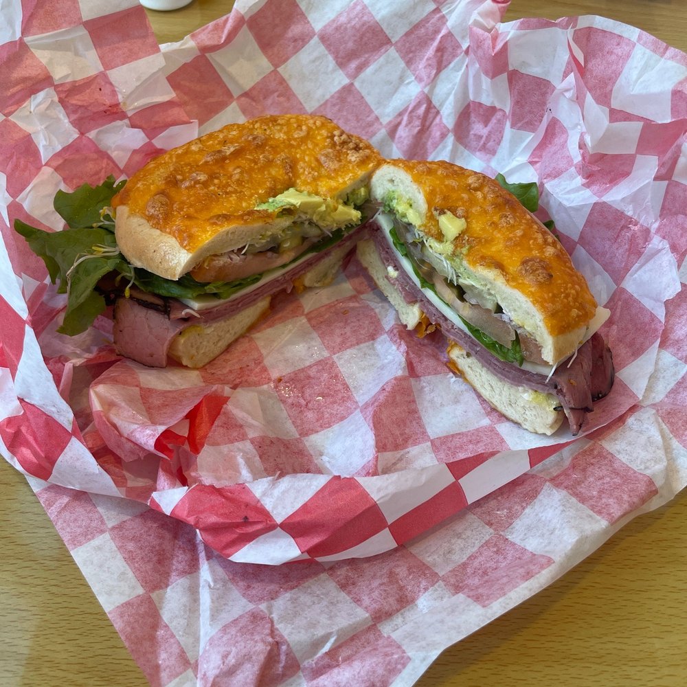 Sarah's Bagel Cafe Meridian - a cut in half sandwich - Bagels Near Me - Meridian, Idaho Sarah's Bagel Cafe Meridian - a cut in half sandwich - Bagels Near Me - Meridian, Idaho