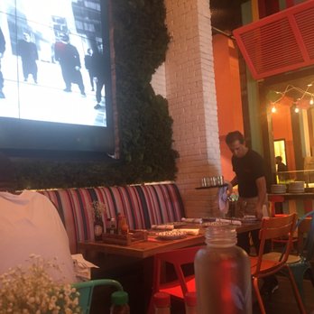 Tacology - Indoor space with large tv screen - Mexican Near Me - Miami, Florida
