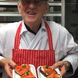 George's Market - Wally holding saltfish made in store!