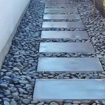 Balboa Brick & Supply Co - This is the look I'm trying to achieve. Pavers and large Mexican beach pebbles - Building Supplies Near Me - North Hills, California Balboa Brick & Supply Co - This is the look I'm trying to achieve. Pavers and large Mexican beach pebbles - Building Supplies Near Me - North Hills, California