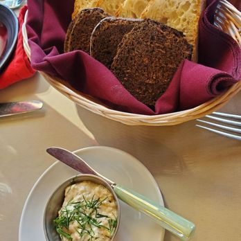 Kalinka Russian Cuisine - Small bread with a tiny serving of eggplant spread - Russian Near Me - Glendale, California Kalinka Russian Cuisine - Small bread with a tiny serving of eggplant spread - Russian Near Me - Glendale, California