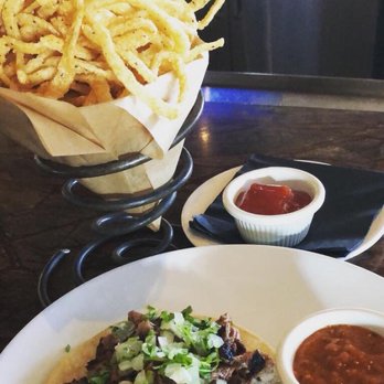 Prime Cut Cafe - Filet mignon taco and onion strings - Steakhouses Near Me - Orange, California