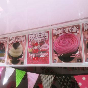 Frosted Frenzy Cupcakes - a display of cupcakes - Desserts Near Me Frosted Frenzy Cupcakes - a display of cupcakes - Desserts Near Me