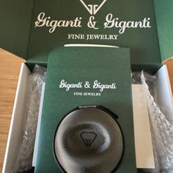 Giganti & Giganti Fine Jewelry - Watch appraisal and travel case.