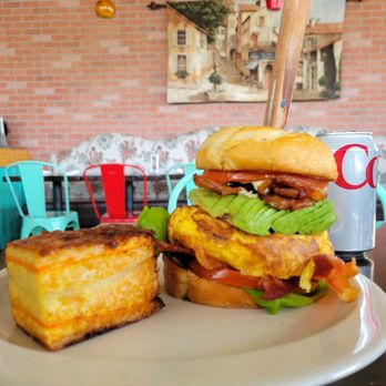 Cafe Le Reve - Egg & brie croissant, with bacon, lettuce, tomato, and (a ton of!) avocado, with the pave potatoes - Breakfast & Brunch Near Me - Riverside, California