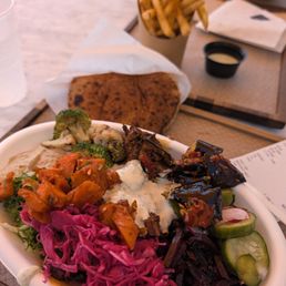 Salad bowl, pita, fries