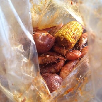 The Boiling Crab - Cajun 1lb Shrimp bag with potatoes & corn added. Yummers! - Cajun/Creole Near Me - San Jose, California The Boiling Crab - Cajun 1lb Shrimp bag with potatoes & corn added. Yummers! - Cajun/Creole Near Me - San Jose, California