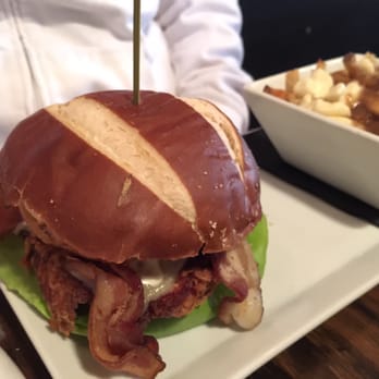 Kenzington Burger Bar - Rodeo fried chicken burger and a traditional poutine - Gastropubs Near Me - Barrie, Ontario