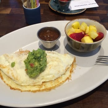 The Henry - Turkey omelette with salsa, avocado and fruit. - New American Near Me - Phoenix, Arizona The Henry - Turkey omelette with salsa, avocado and fruit. - New American Near Me - Phoenix, Arizona