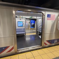 MTA - Main Street Subway Station - 7 Train on its Platform
