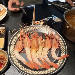 Raw red shrimp. You can eat raw like sushi or deep in hot pot Raw red shrimp. You can eat raw like sushi or deep in hot pot