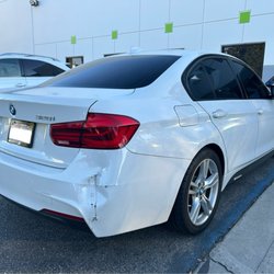 Supreme Collision Center - Damage to passenger rear bumper