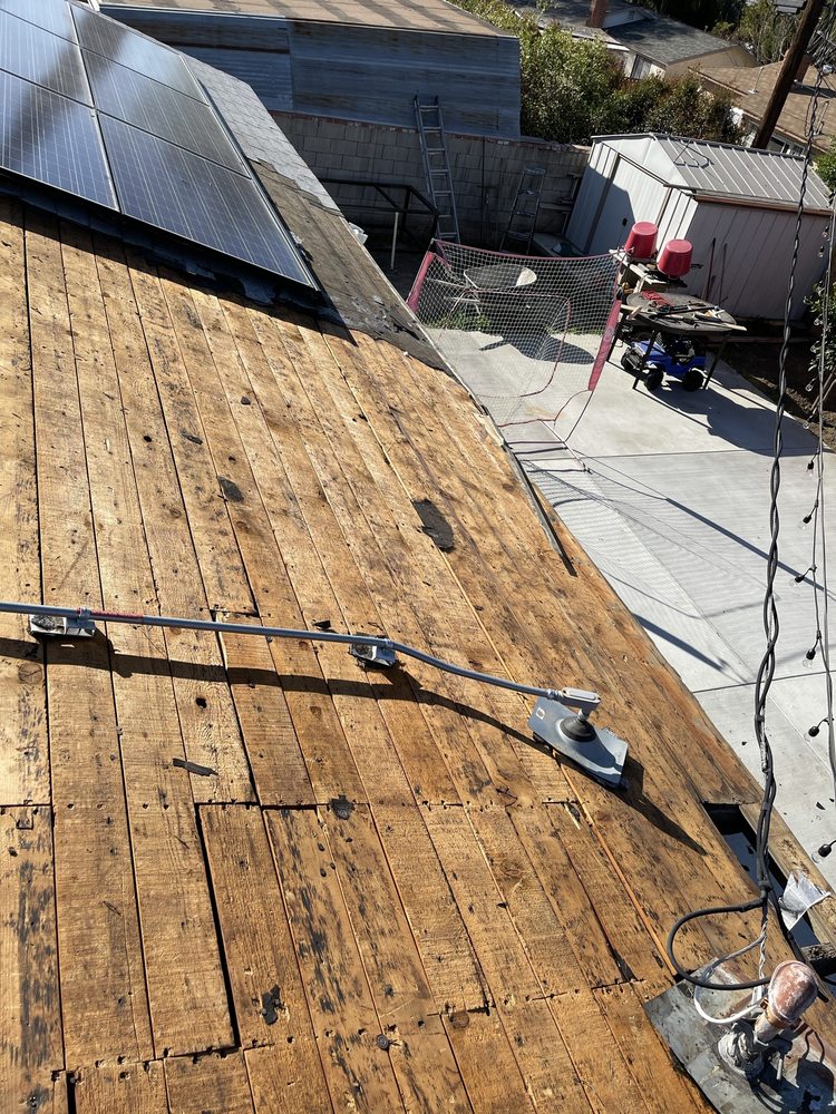 Slide of Oscar Roofing  services