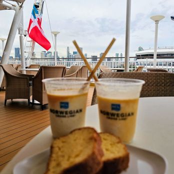 Norwegian Cruise Line - First Pina Coladas with cake, NCL Gem, Miami Cruise Port - Travel Services Near Me - Downtown Miami, Florida