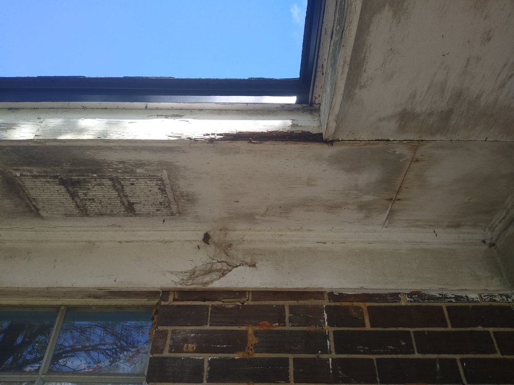 Slide of Tadlock Roofing