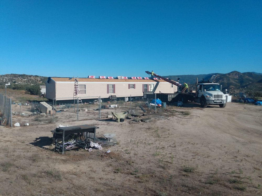 Slide of Outlaw Roofing