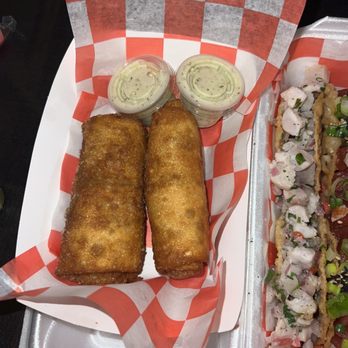 Taco Bao’T It - Ropa Vieja Spring Rolls ( 2 Rolls) - Asian Fusion Near Me - Miami, Florida Taco Bao’T It - Ropa Vieja Spring Rolls ( 2 Rolls) - Asian Fusion Near Me - Miami, Florida