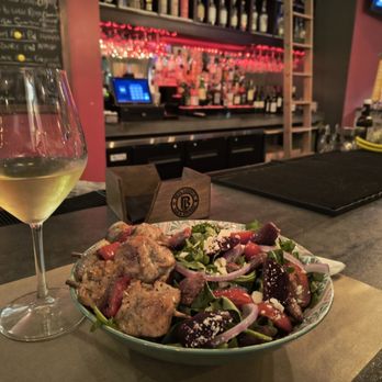 Beta Lounge - Arugula Beet salad with chicken skewers, and a glass of Bourgogne Blanc - Lounges Near Me - Berkeley, California