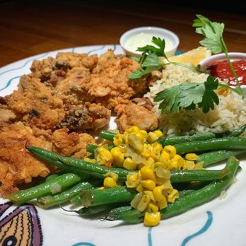 Anthony's Restaurant - Pan Fried Willapa Bay Oysters with almond basmati rice pilaf, green beans and corn - Seafood Near Me - Bellingham, Washington