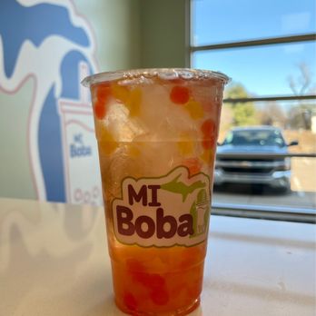 MI Boba - Peach iced tea with mango stars, peach poppers and strawberry poppers - Bubble Tea Near Me - Kalamazoo, Michigan