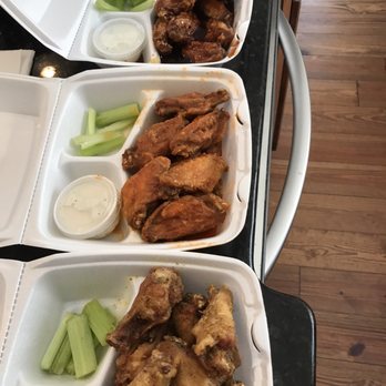 Wings On Wheels - trays of food on a table - Food Trucks Near Me - Haralson, Georgia Wings On Wheels - trays of food on a table - Food Trucks Near Me - Haralson, Georgia