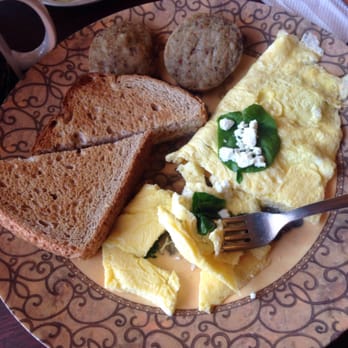 Le Petit Cafe Coffee House - Feta and spinach omelette with a side of jimmy dean sausage and wheat toast. - Cafes Near Me - Kenner, Louisiana Le Petit Cafe Coffee House - Feta and spinach omelette with a side of jimmy dean sausage and wheat toast. - Cafes Near Me - Kenner, Louisiana