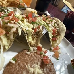 Fish tacos were good. Wish there was a little bit more fish. Fish tacos were good. Wish there was a little bit more fish.