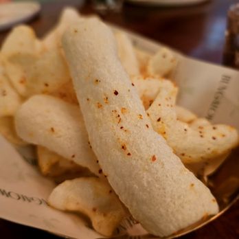 Bungalow - Somethign papadum-esque to munch on. Puffed rice with chili. Very tasty - Indian Near Me - New York, New York
