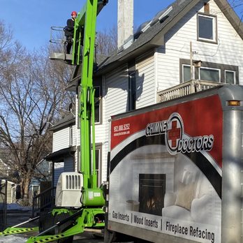 Chimney Doctors - Chimney Doctors' boom lift and work truck. - Masonry/Concrete Near Me - Burnsville, Minnesota