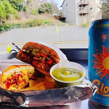 Calle - a hot dog and a drink on a table - Street Vendors Near Me - Lincoln City, Oregon Calle - a hot dog and a drink on a table - Street Vendors Near Me - Lincoln City, Oregon