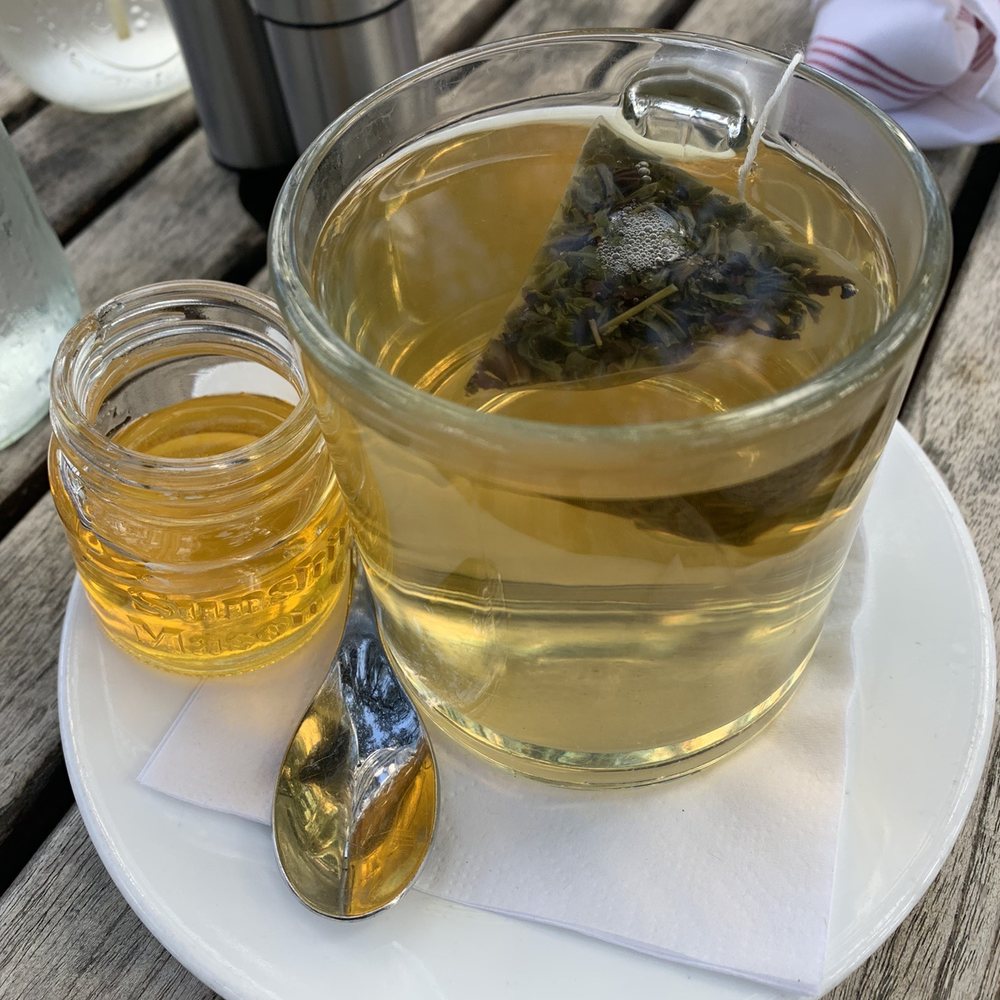 Vinaigrette - Hot jasmine tea with honey on the side - Salad Near Me - Austin, Texas Vinaigrette - Hot jasmine tea with honey on the side - Salad Near Me - Austin, Texas