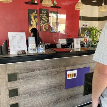 Thai BBQ & Noodle - a man standing at the counter - Thai Near Me - Cypress, California