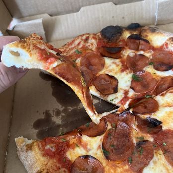 Decasa - Pepperoni slice showing crust and flop - Pizza Near Me - Midland, Texas