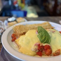 Ranee's On Main - Prawn omelette. 3 cheese, onions, mushrooms, celery, tomatoes, avocado and hollandaise sauce.