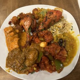 Onion pakora, biryani, dal, chili chicken, baby corn Manchurian, butter chicken, curry.