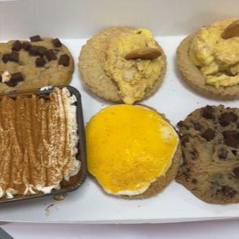 Crumbl - Golf Mill - Chocolate chip  Banana pie cookie  Tres leche cake  Lemon cheesecake cookie - Bakeries Near Me - Niles, Illinois