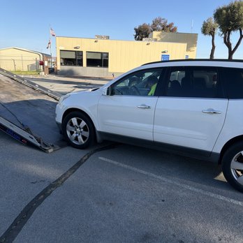 Dicks Community Towing - Photo of him loading my vehicle - Towing Near Me - Campbell, California