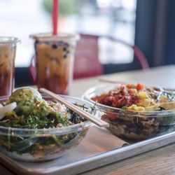 Freshido - Thai tea and two bowls of Poké.