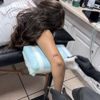 EC Tattoo and Body Piercing - Getting her first tattoo - Tattoo Near Me - El Cajon, California EC Tattoo and Body Piercing - Getting her first tattoo - Tattoo Near Me - El Cajon, California