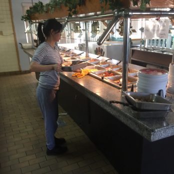 Panda Garden - a woman standing in front of a buffet - Chinese Near Me - Springhill, Louisiana Panda Garden - a woman standing in front of a buffet - Chinese Near Me - Springhill, Louisiana