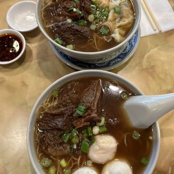 Mike's Noodle House - Beef brisket noodle soup with sui kau (top) and squid balls (bottom) - Cantonese Near Me - Seattle, Washington Mike's Noodle House - Beef brisket noodle soup with sui kau (top) and squid balls (bottom) - Cantonese Near Me - Seattle, Washington