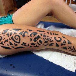 Skindustries Tattoo and Body Piercing Studio - Tribal style design Leg piece