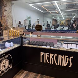 Live by the Sword Tattoo - Entrance that displays a variety of jewelry options.