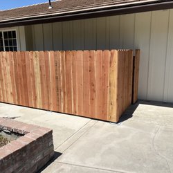 Top Rail Fence - 4' wood fence around air conditioner