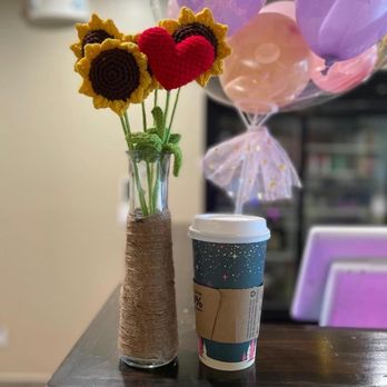 Tomsa Sushi - a cup of coffee and a bouquet of sunflowers - Sushi Bars Near Me - Oakland, California Tomsa Sushi - a cup of coffee and a bouquet of sunflowers - Sushi Bars Near Me - Oakland, California